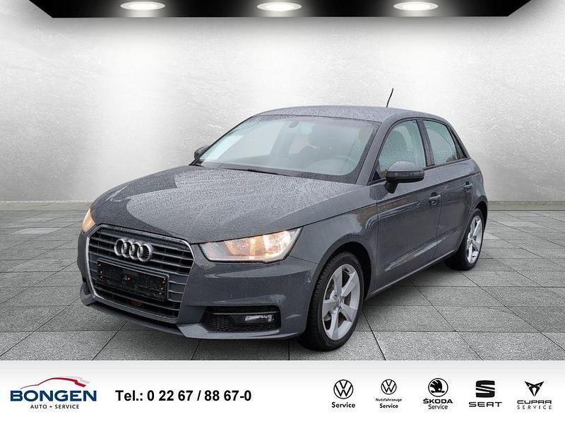 Grau Gebraucht 2016 Audi A1 Sportback Sport Kleinwagen | 12.990 € (Fairer Preis) - Bild 1/4