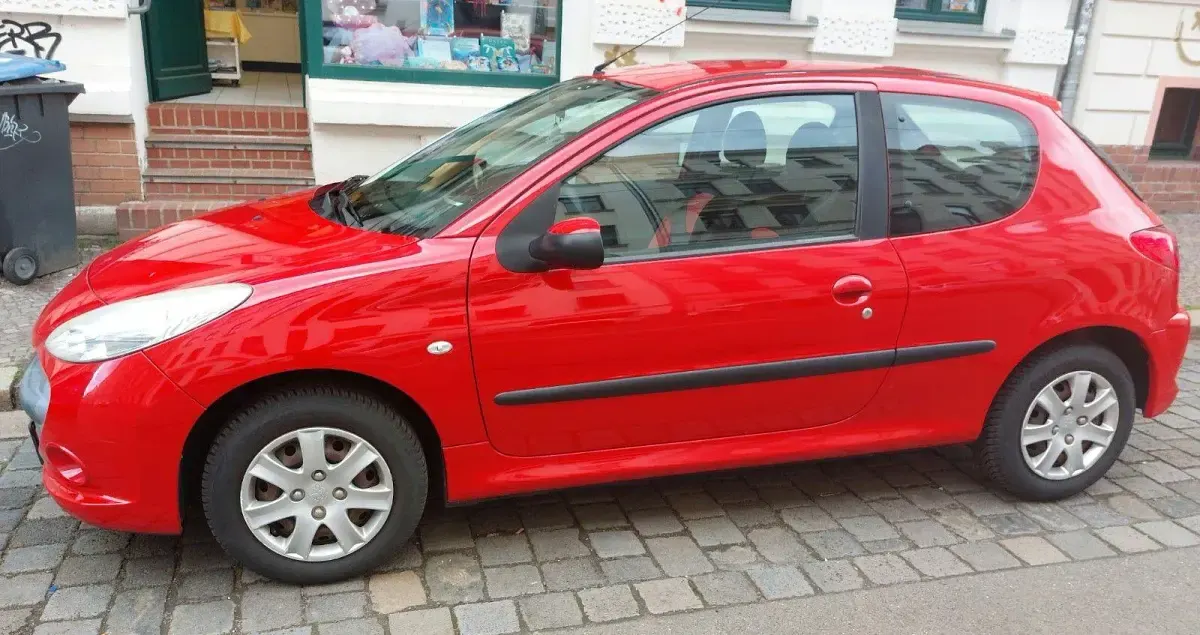 Gebraucht Peugeot 206+ 60 PS (44 kW) 2009 Rot Kleinwagen