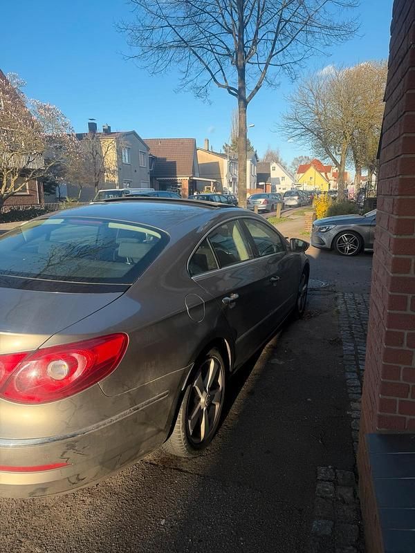 Second-hand VW CC 167 CP (122 kW) 2010 Auriu Berlinǎ