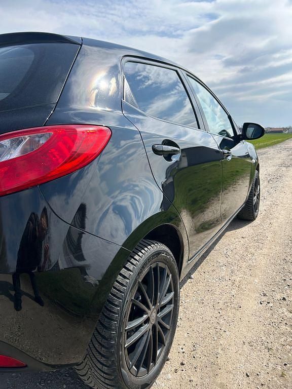 Gebraucht Mazda 2 75 PS (55 kW) 2008 Schwarz Kleinwagen