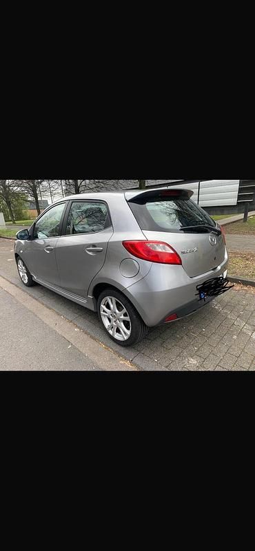 Gebraucht Mazda 2 Inclusive 88 PS (64 kW) 2010 Grau Kleinwagen