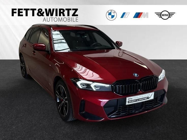 Fire red metallic Gebraucht 2024 BMW 330e M Sport Kombi | 51.900 € (Teuer) - Bild 1/3