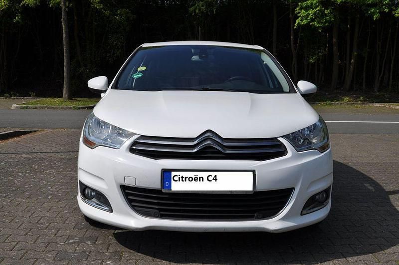 Używany Citroën C4 Exclusive 114 KM (83 kW) 2014 Biały Sedan/Limuzyna