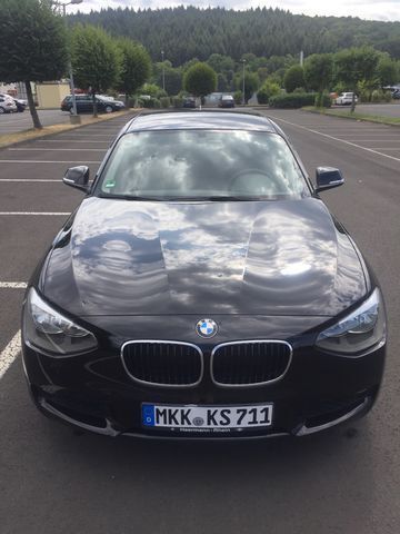 Gebraucht BMW 114 102 PS (75 kW) 2014 Schwarz metallic Kleinwagen