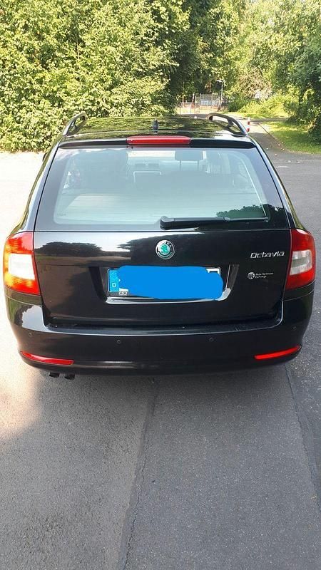 Second-hand Skoda Octavia Ambiente 122 CP (89 kW) 2011 Negru Break