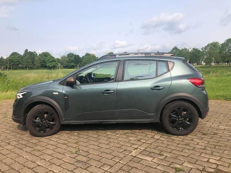 Grün Gebraucht 2024 Dacia Sandero Extreme Kleinwagen | 19.500 € (Fairer Preis) - Bild 1/4