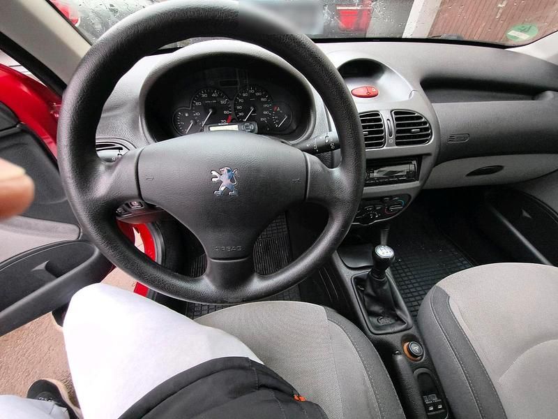 Gebraucht Peugeot 206 75 PS (55 kW) 2009 Rot Kleinwagen