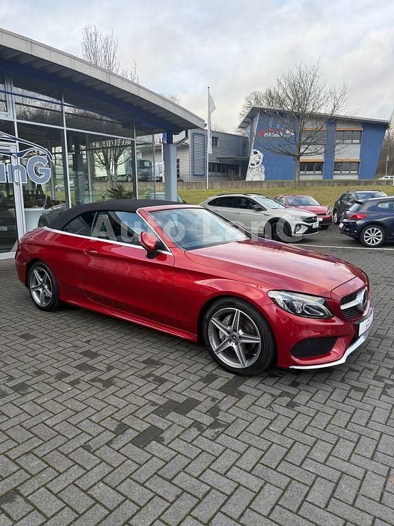 Hyazinthrot Gebraucht 2018 Mercedes C180 AMG line Cabrio | 28.990 € (Fairer Preis) - Bild 1/4