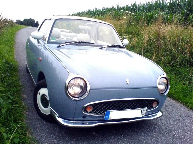 Grau Gebraucht 1991 Nissan Figaro Cabrio | 9.999 € - Bild 1/4