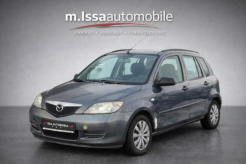 Grau Gebraucht 2004 Mazda 2 Kleinwagen | 1.390 € (Fairer Preis) - Bild 1/4
