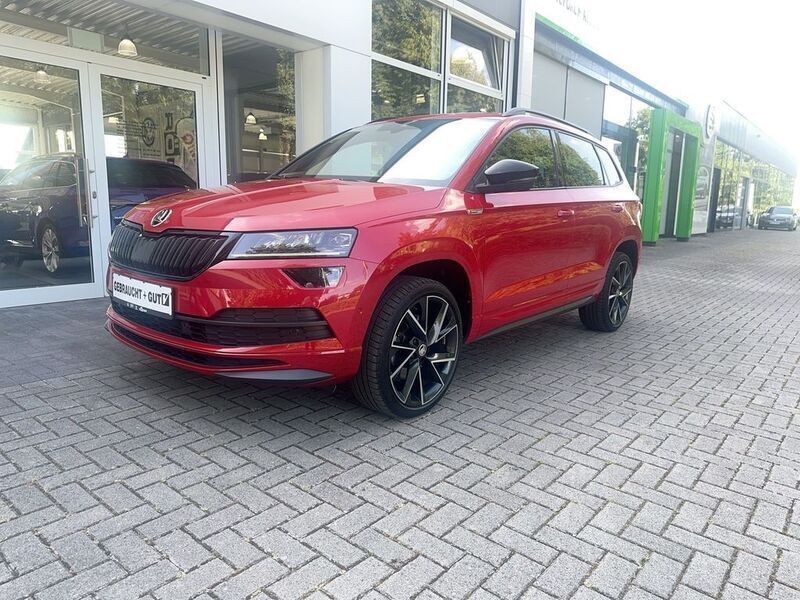 Velvetrot metallic met. Gebraucht 2021 Skoda Karoq SportLine SUV | 26.990 € (Etwas zu teuer) - Bild 1/4