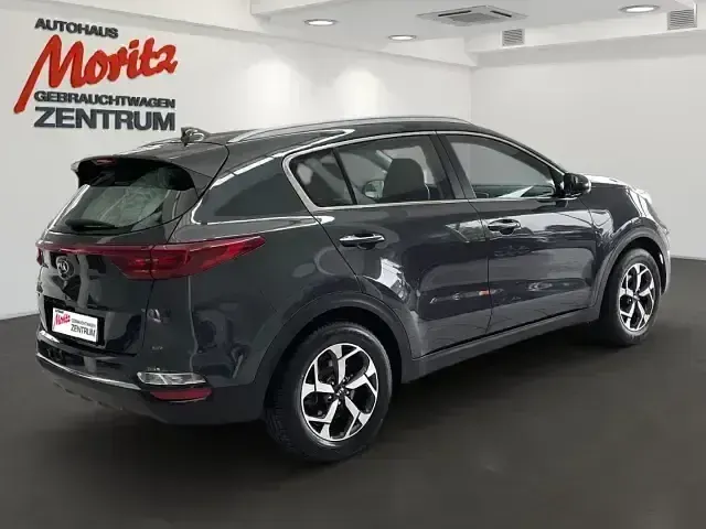 Gebraucht Kia Sportage Vision 177 PS (130 kW) 2020 H8g) pentametal met. (grau SUV