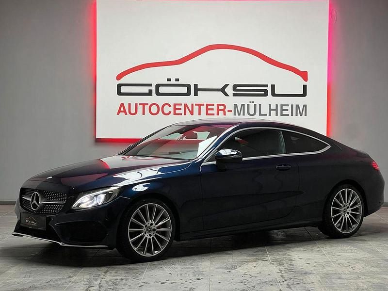 Blau Gebraucht 2017 Mercedes C180 AMG line Coupé | 24.950 € (Teuer) - Bild 1/3