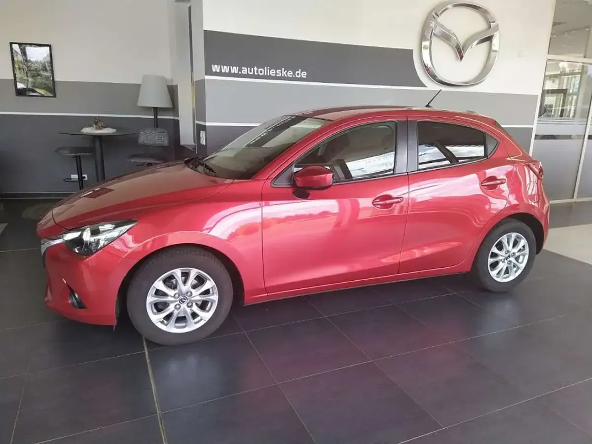 Gebraucht Mazda 2 Exclusive 90 PS (66 kW) 2015 Rubinrot metallic Kleinwagen