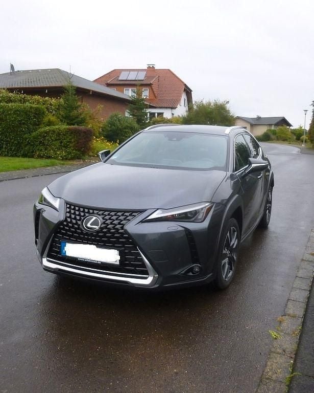 Grau Gebraucht 2023 Lexus UX 250h SUV | 31.700 € - Bild 1/4