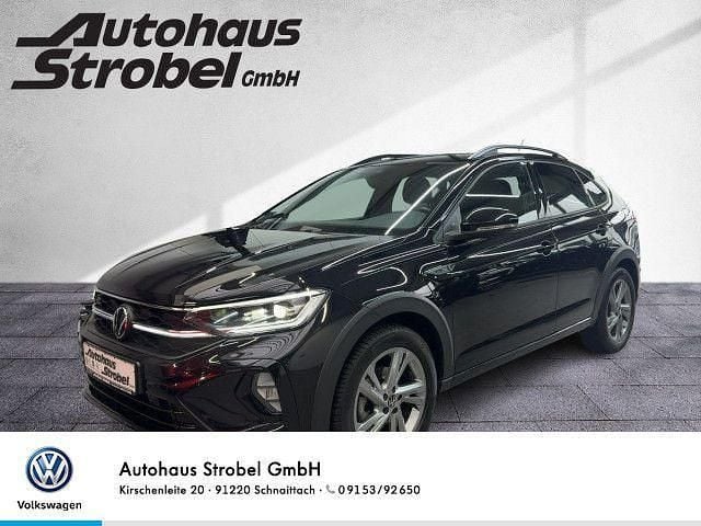 Deep black perleffekt (metallic) Gebraucht 2022 VW Taigo R-line SUV | 23.990 € (Fairer Preis) - Bild 1/3