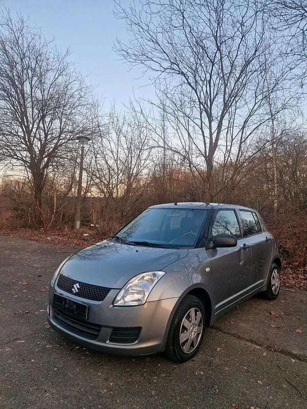 Grau Gebraucht 2009 Suzuki Swift Kleinwagen | 2.550 € (Etwas zu teuer) - Bild 1/4