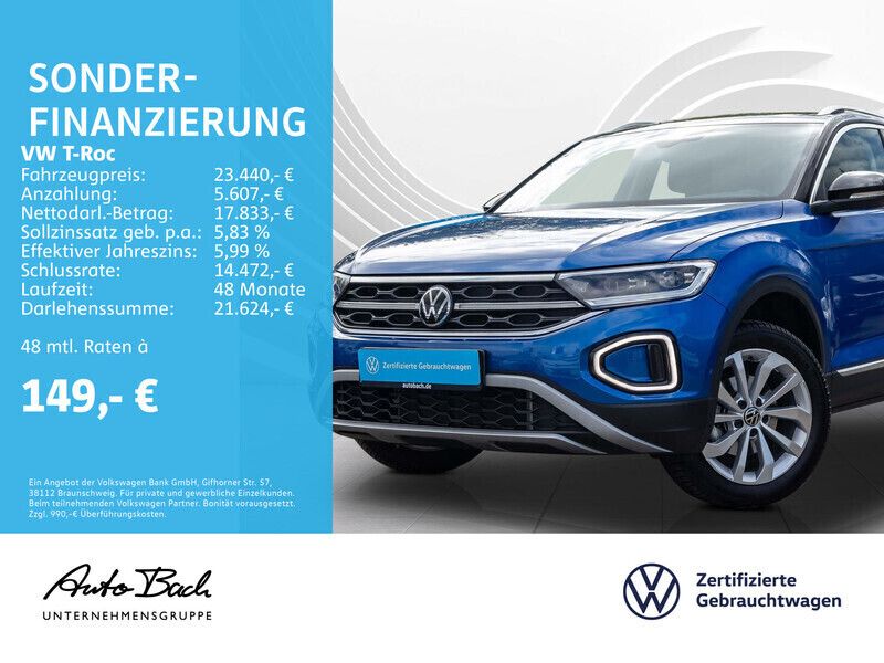 Blau (ravennablau metallic) Gebraucht 2023 VW T-Roc Style SUV | 22.740 € (Fairer Preis) - Bild 1/4