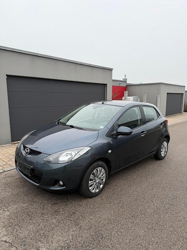 Grau Gebraucht 2008 Mazda 2 Kleinwagen | 2.599 € (Fairer Preis) - Bild 1/4
