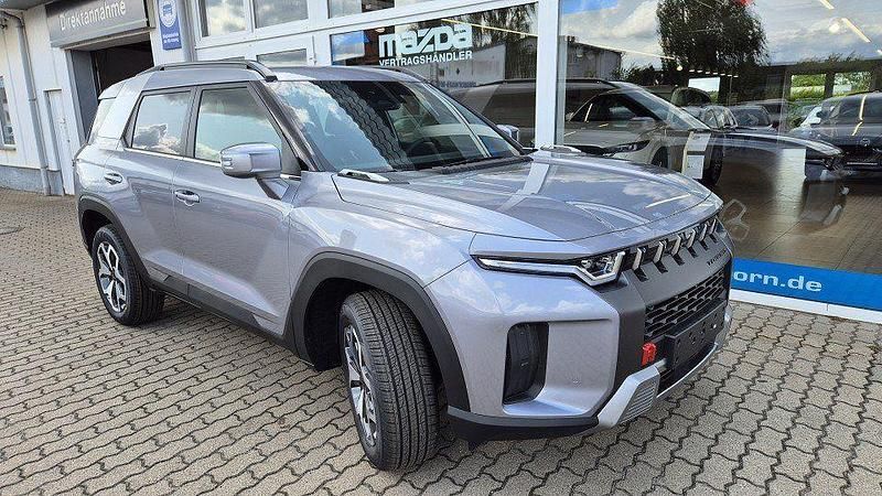 Silber Neu 2025 Ssangyong (KGM) Torres SUV | 31.490 € - Bild 1/4