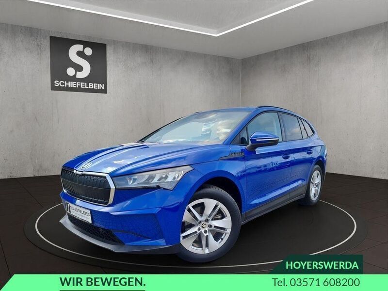 Blau Gebraucht 2023 Skoda Enyaq iV Loft SUV | 26.440 € (Superpreis) - Bild 1/4