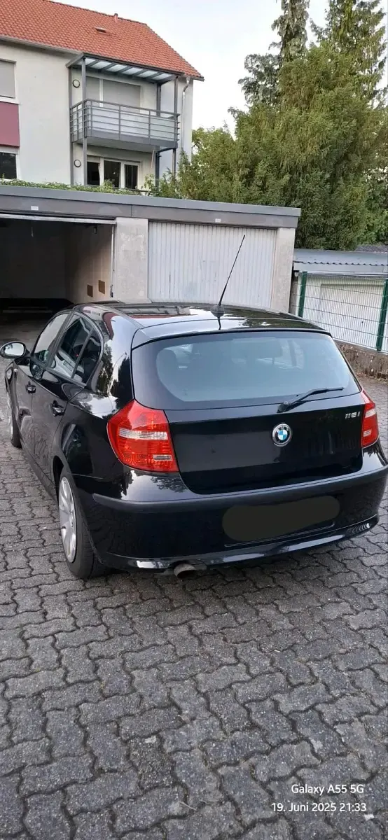 Gebraucht BMW 116 122 PS (89 kW) 2009 Schwarz Kleinwagen