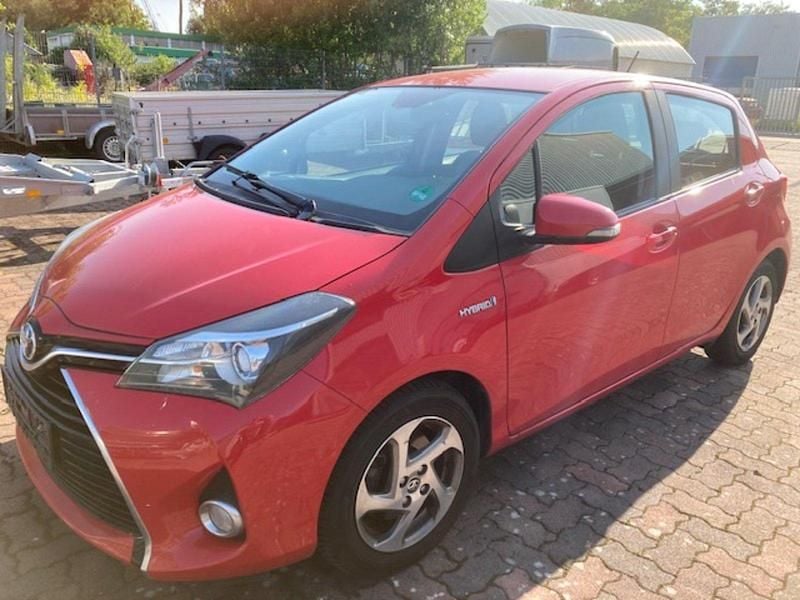 Rot Gebraucht 2014 Toyota Yaris Hybrid Kleinwagen | 10.400 € (Fairer Preis) - Bild 1/4