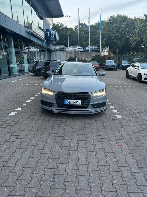 Grau Gebraucht 2017 Audi A7 S-Line Kleinwagen | 33.900 € - Bild 1/4