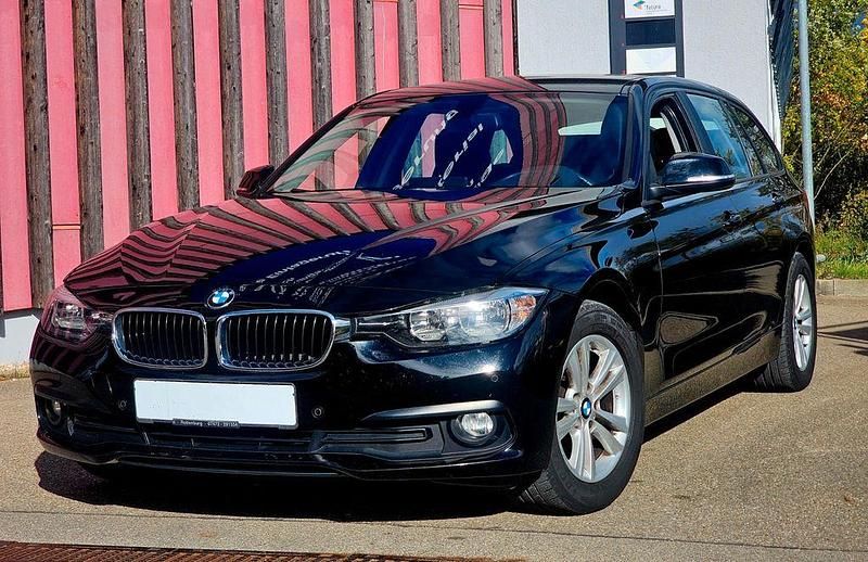 Schwarz Gebraucht 2017 BMW 320 Advantage Kombi | 10.999 € (Superpreis) - Bild 1/4