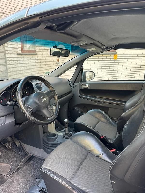 Second-hand Mitsubishi Colt 109 CP (80 kW) 2007 Albastru Cabrio