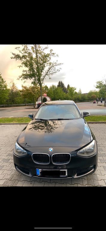 Schwarz Gebraucht 2014 BMW 114 Sport Line Kleinwagen | 6.200 € (Fairer Preis) - Bild 1/4