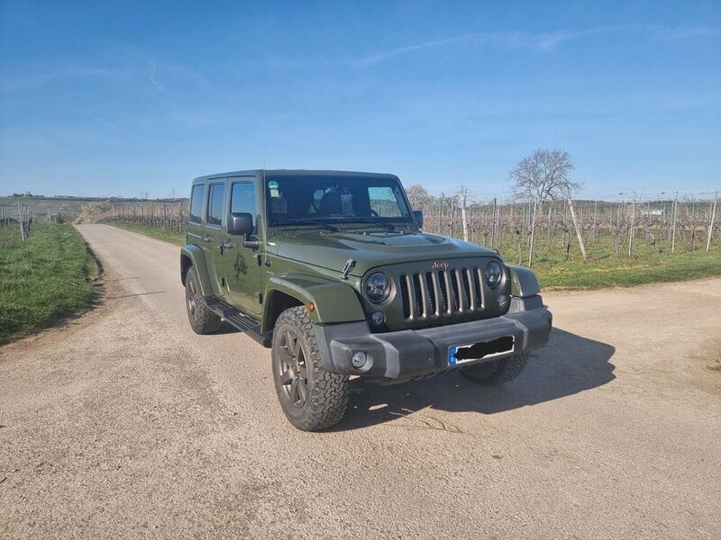 Grün Gebraucht 2017 Jeep Wrangler SUV | 34.600 € (Etwas zu teuer) - Bild 1/4