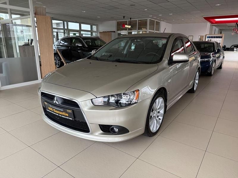 Gold Gebraucht 2009 Mitsubishi Lancer Sportback Intense Limousine | 8.490 € (Etwas zu teuer) - Bild 1/4