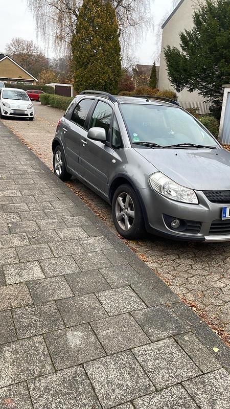 Usado Suzuki SX4 107 HP (78 kW) 2007 Cinzento Sedan