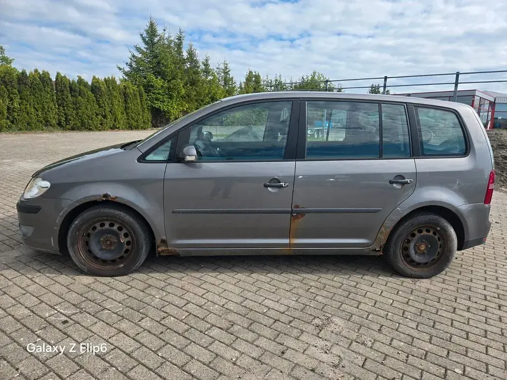 Używany VW Touran Conceptline 90 KM (66 kW) 2007 Brązowy Minivan