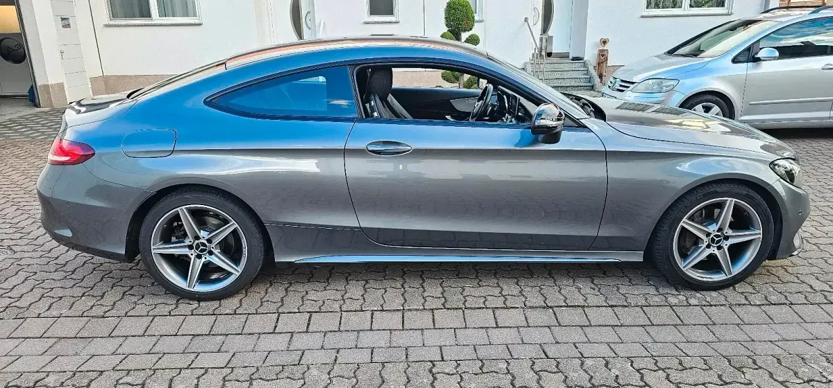 Gebraucht Mercedes C200 AMG line 184 PS (135 kW) 2016 Grau Coupé