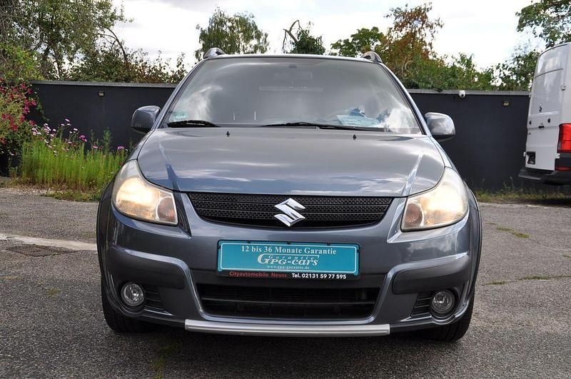 Grau Gebraucht 2008 Suzuki SX4 Comfort Limousine | 4.999 € (Etwas zu teuer) - Bild 1/4