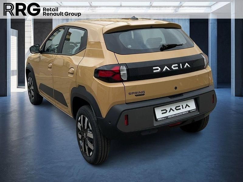 Gebraucht Dacia Spring Expression 19 kW (26 PS) 2025 Safaribeige Kleinwagen