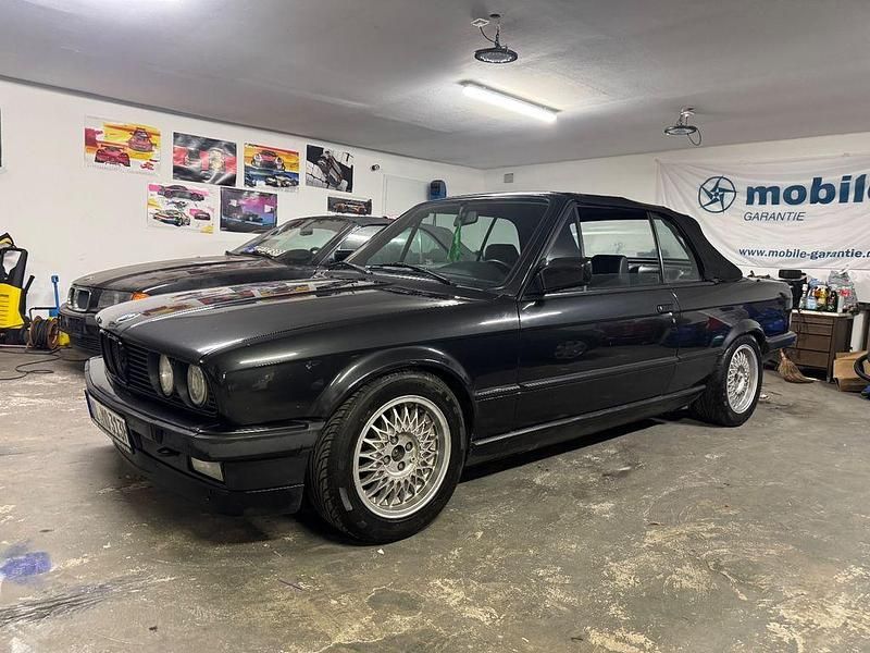 Schwarz Gebraucht 1989 BMW 320 Cabriolet Performance Cabrio | 13.300 € - Bild 1/4
