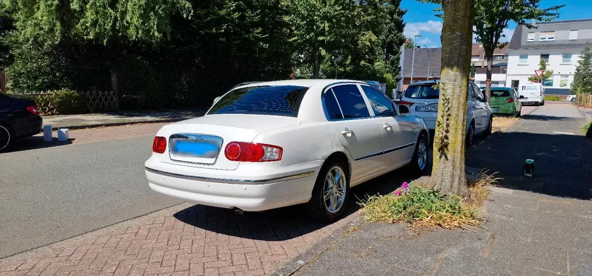 Gebraucht Kia Opirus 203 PS (149 kW) 2006 Weiß Limousine