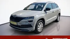 Grau Gebraucht 2021 Skoda Karoq SportLine SUV | 28.380 € (Fairer Preis)