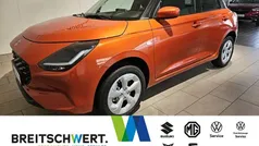 Flame orange pearl metallic Gebraucht 2025 Suzuki Swift Comfort Limousine | 18.450 € (Fairer Preis)