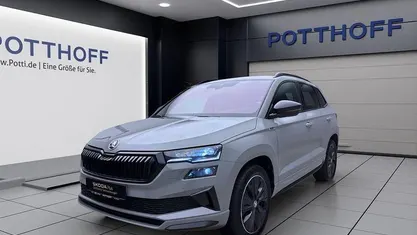 Grau Gebraucht 2024 Skoda Karoq SportLine SUV | 33.777 € (Guter Preis)