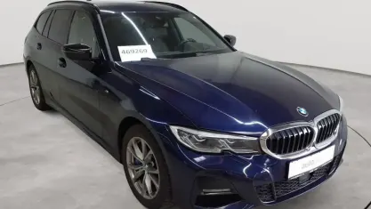 Gebraucht BMW 330 M Sport 184 PS (135 kW) 2021 Tansanitblau ii metallic Kombi