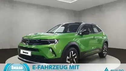 Gebraucht Opel Mokka-e Elegance 100 kW (136 PS) 2022 Matcha grün (metallic) SUV