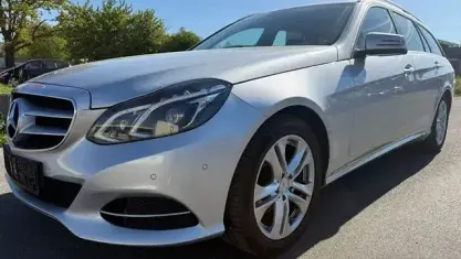 Używany Mercedes E220 170 KM (125 kW) 2014 Srebrny Kombi