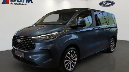 Gebraucht Ford Tourneo Custom Titanium 170 PS (125 kW) 2025 Chrome blue metallic Van