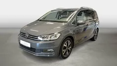 Grau Gebraucht 2022 VW Touran Highline Van / Kleinbus | 26.050 € (Fairer Preis)