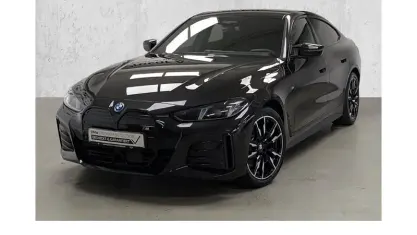 Używany BMW i4 Performance 400 kW (544 KM) 2025 Czarny Sedan/Limuzyna