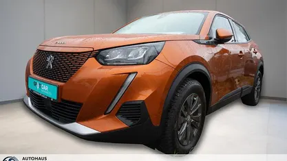 Second-hand Peugeot e-2008 Active 100 kW (136 CP) 2021 Portocaliu SUV